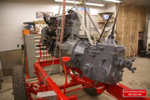 Engine and Transmission being lowered in to the frame <div class="download-image"><a href="https://oldinternationaltrucks.com/wp-content/uploads/2017/09/DSC02389.jpg" download><i class="fa fa-download"></i> <span class="full-size"></span></a></div>